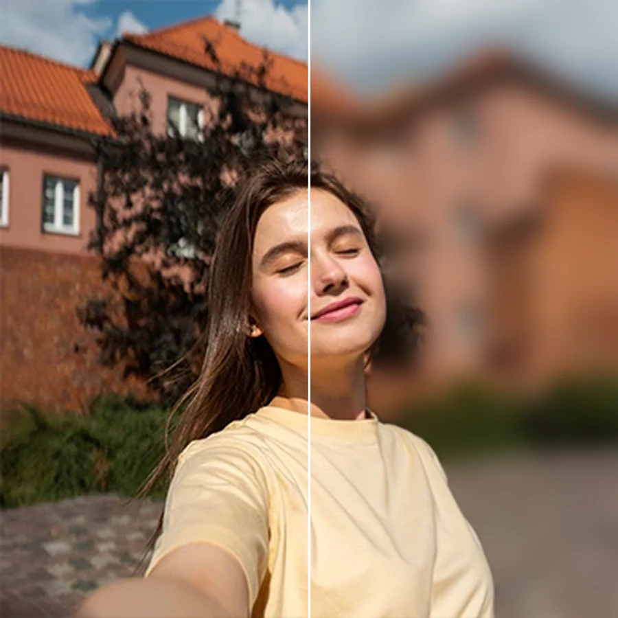 Portrait photo edited with a tilt-shift blur effect creating a narrow sharp band around the person and a soft miniature-style blur elsewhere